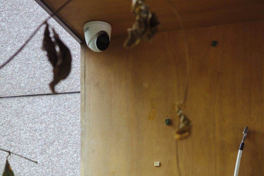 simple security camera mounted on clean wall