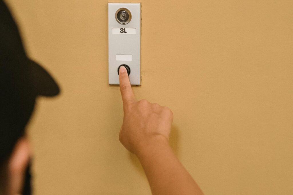 smart video doorbell mounted at front door