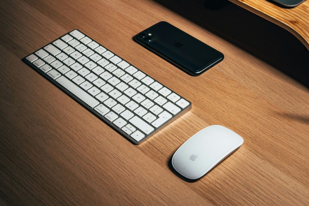 wireless keyboard and mouse on full width desk mat