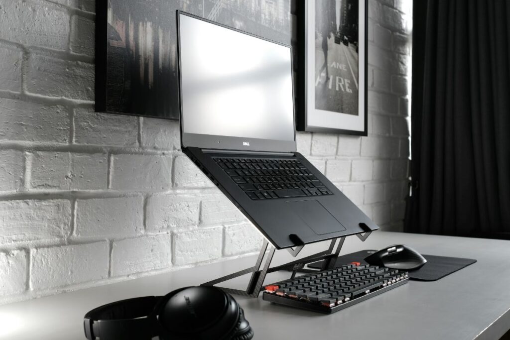 adjustable laptop stand on clean minimal desk