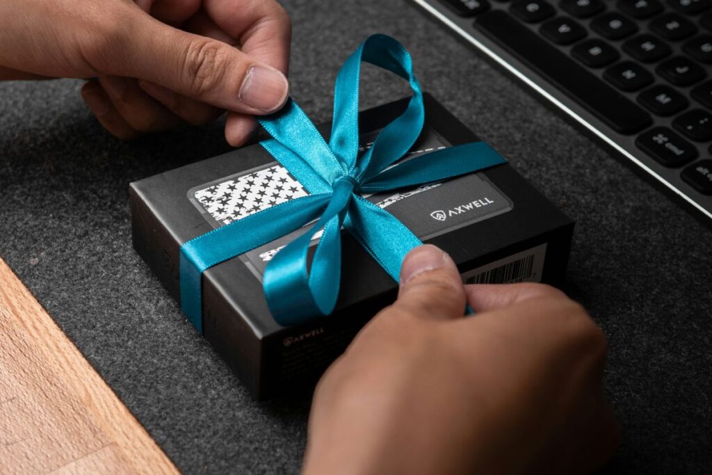 thoughtfully wrapped minimal tech gift clean surface