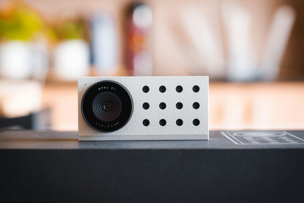 small mini projector on clean minimal desk