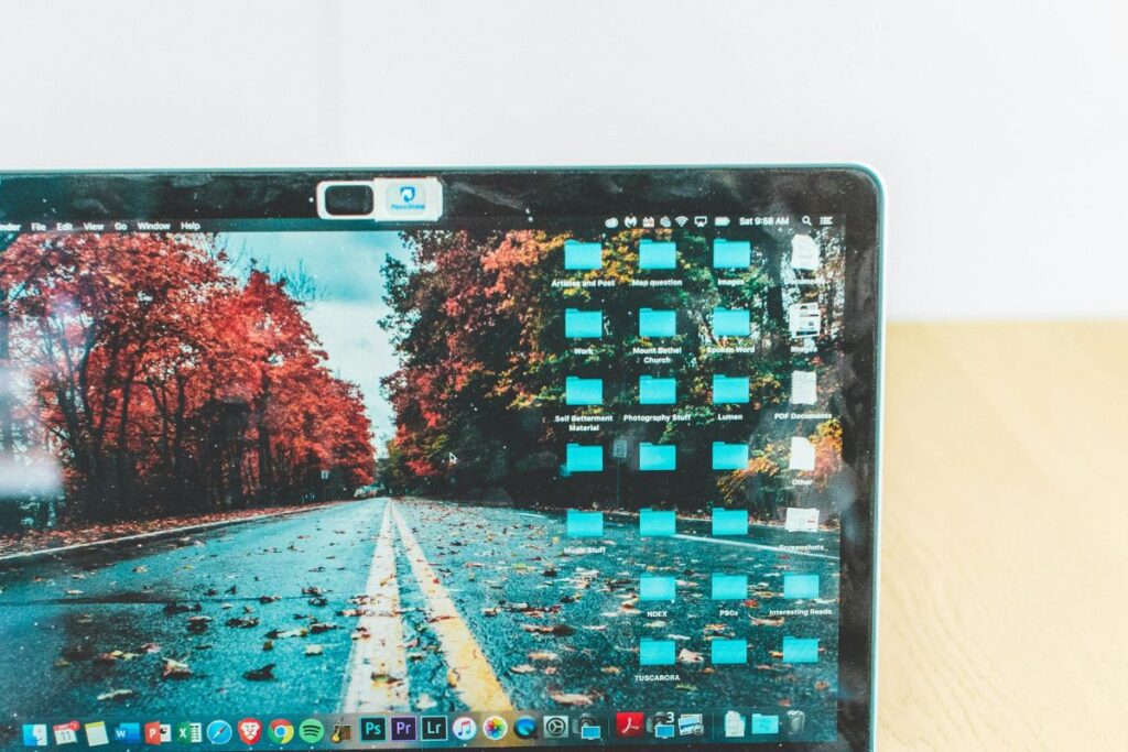 webcam privacy cover sliding on laptop screen